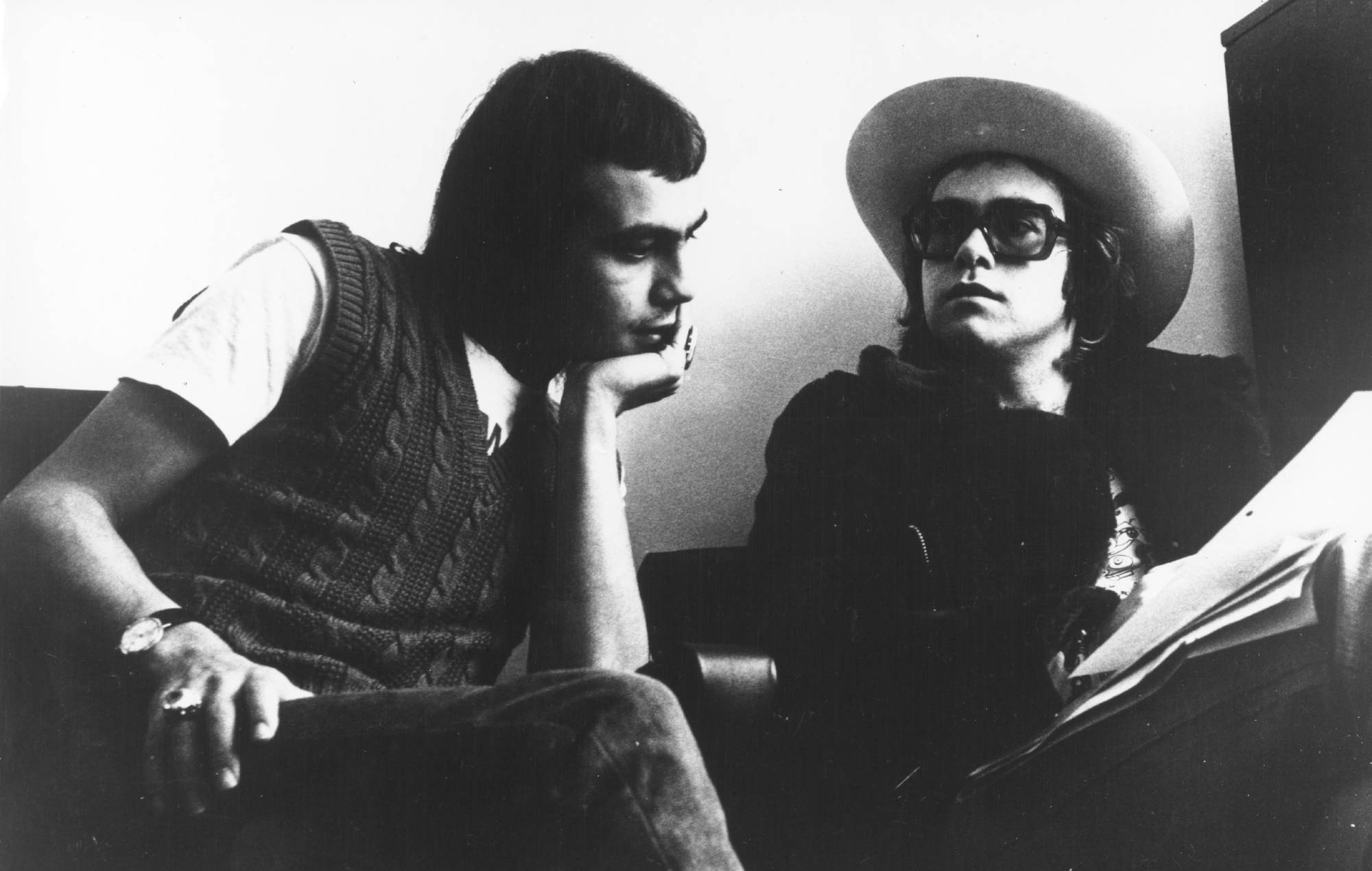 Elton John and Bernie Taupin pose for a portrait circa 1973 in London, England. (Photo courtesy of Michael Ochs/Getty Images)