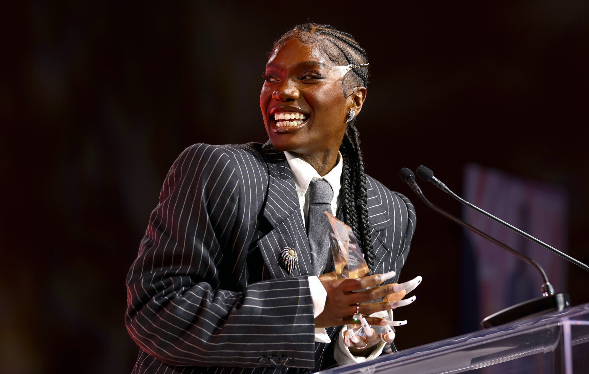 Doechi accepts the Hip-Hop Disruptor of the Year award at Variety's 2024 Hitmakers Brunch. Photo: Joe Scarnici/Variety via Getty Images