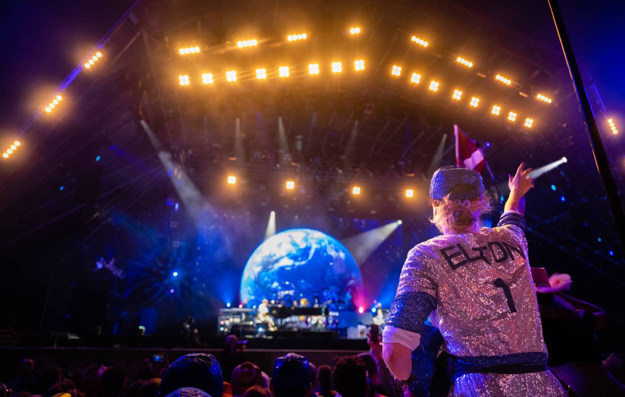 The crowd watches Sir Elton John perform on the Pyramid Stage on day five of the Glastonbury Festival 2023 Worthy Farm, Pilton on June 25, 2023 in Glastonbury, England. (Photo by Samir Hussain/WireImage)