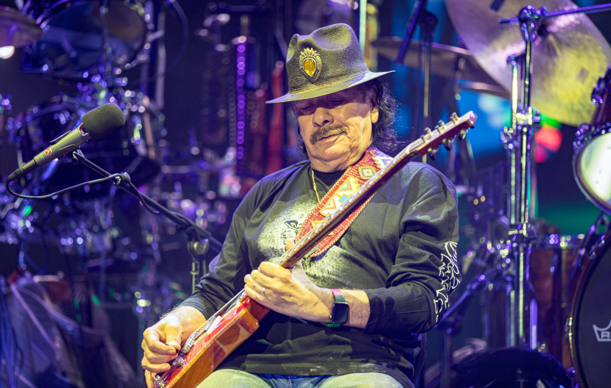 Carlos Santana performing live on stage