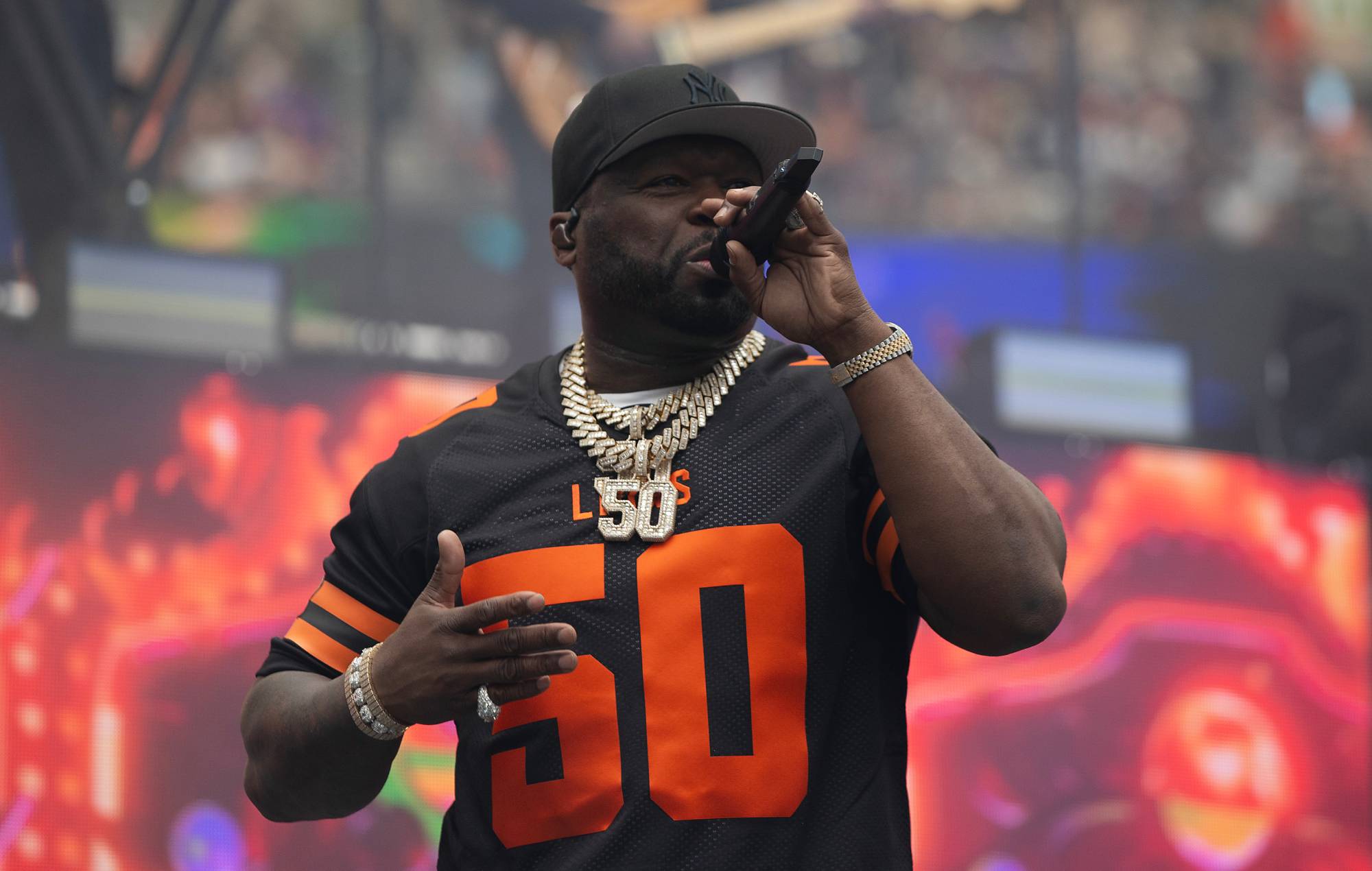 50 Cent performing on stage at the BC Lions season opener against the Calgary Stampeders in Vancouver on June 15, 2024. (Photo by Andrew Chin/Getty Images)