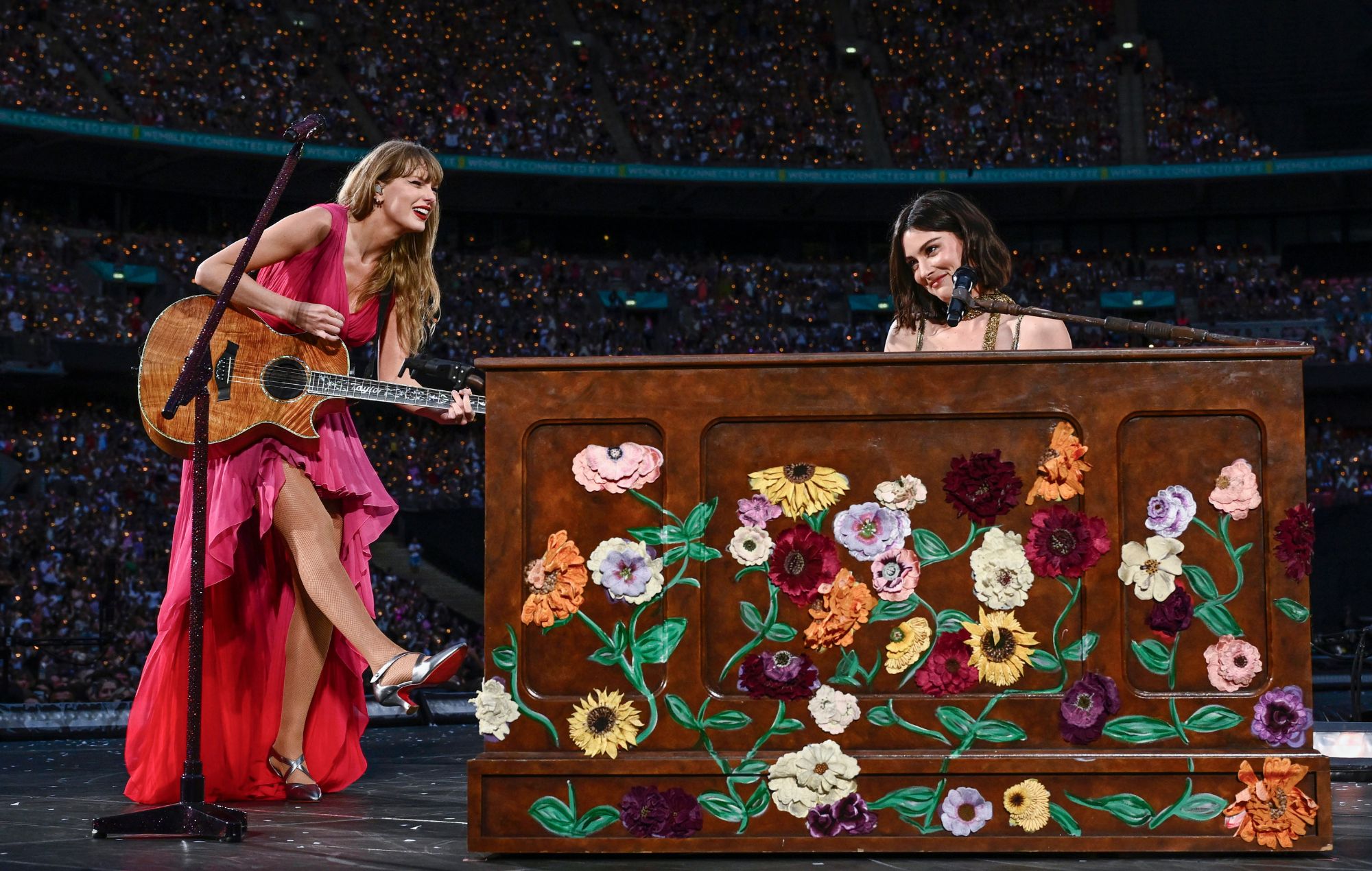 Taylor Swift and Grace Abrams perform on stage during "Taylor Swift | The Eras Tour"