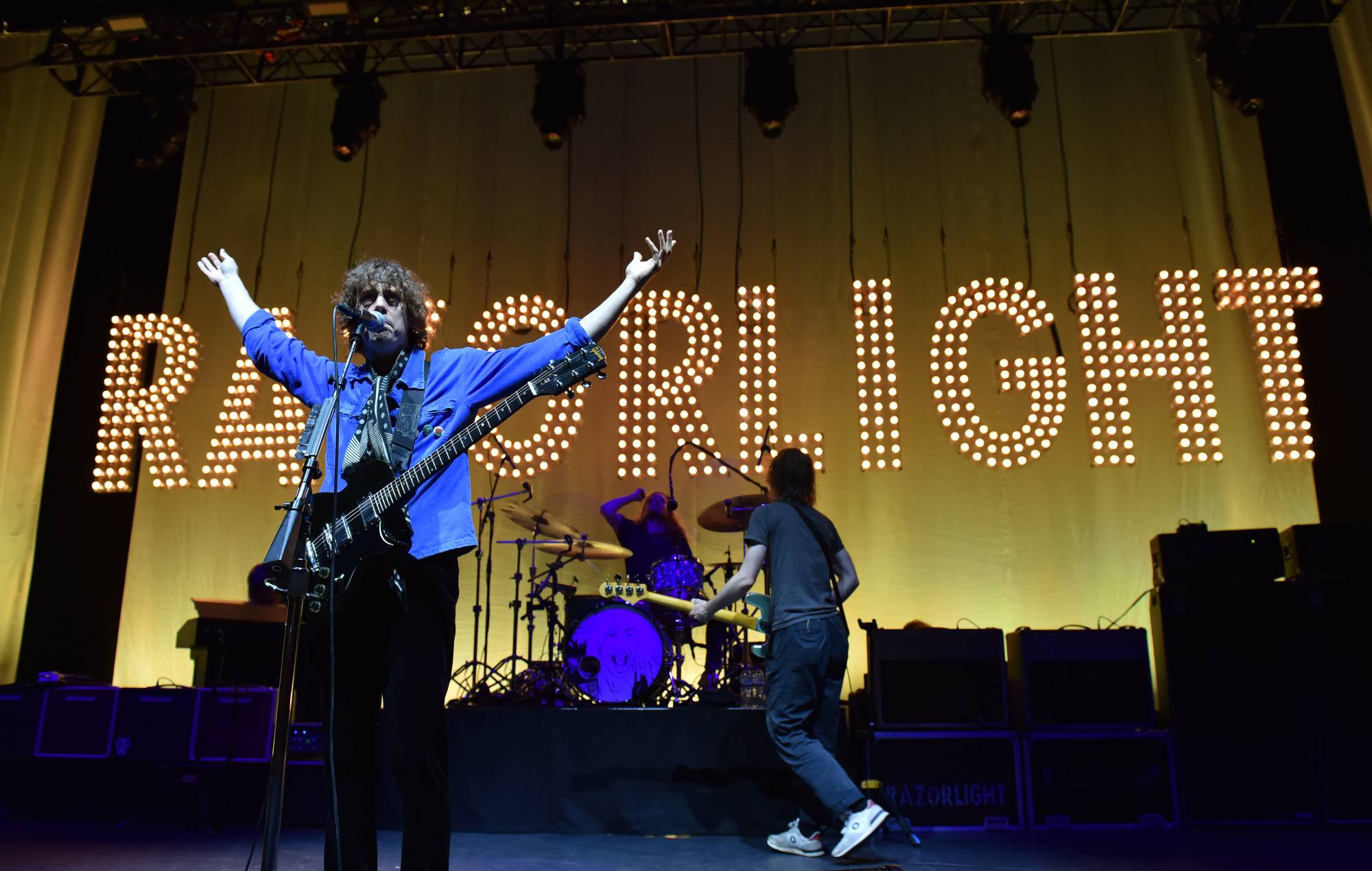 Johnny Borrell, Andy Burrose and Karl Dalemo from Razorlight perform on the stage at Eventim Apollo on May 12, 2023 in London, England. (Photo c brindon/Redferns)