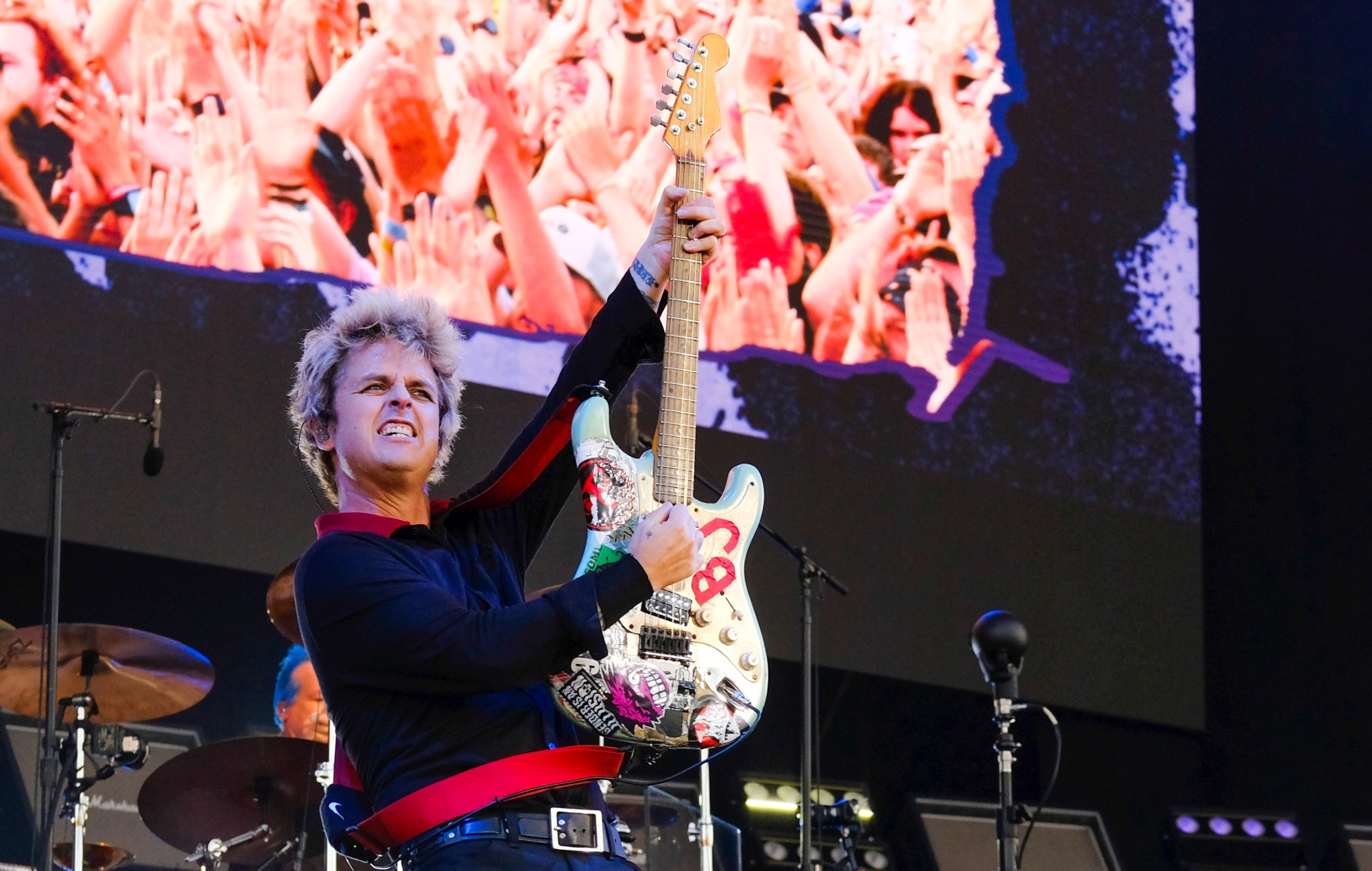 Billy Joe Armstrong performs live on stage with Green Day